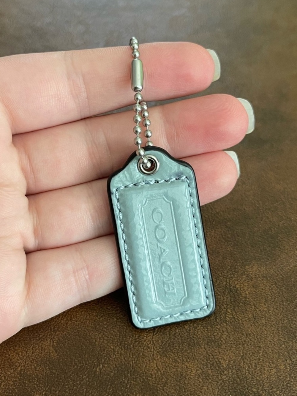 Coach blue hangtag